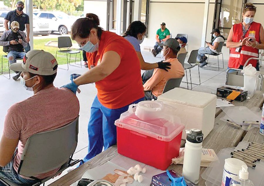 A migrant farm worker bus brought workers to the health department and FDOH-Okeechobee staff administered the first dose of the Moderna COVID-19 vaccine.